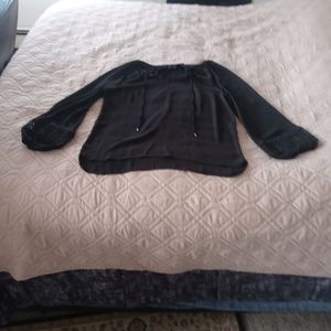 A black long sleeve dress shirt size medium worn a few times.